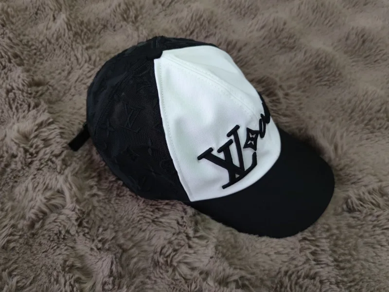 Cap with monogram pattern