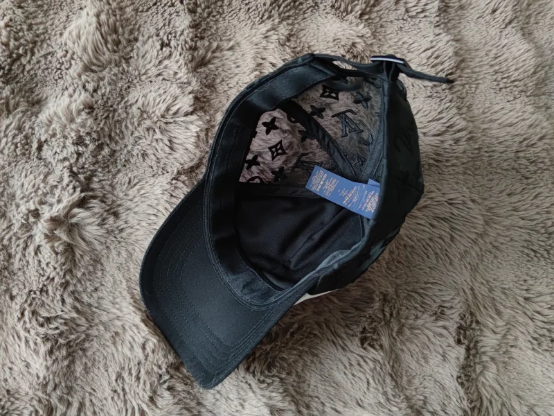 Cap with monogram pattern