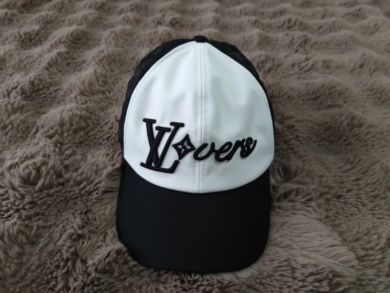 Cap with monogram pattern