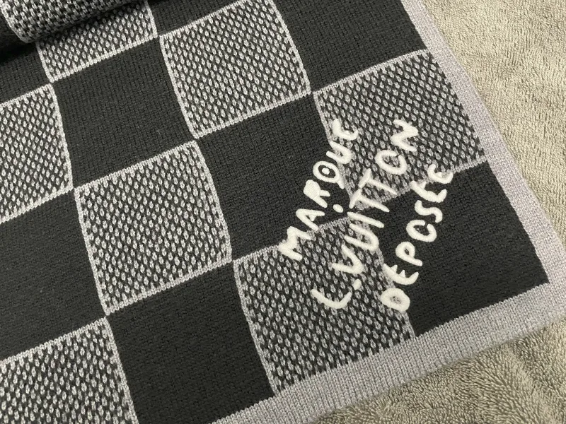 Geklaagde gebreide sjaal en muts set